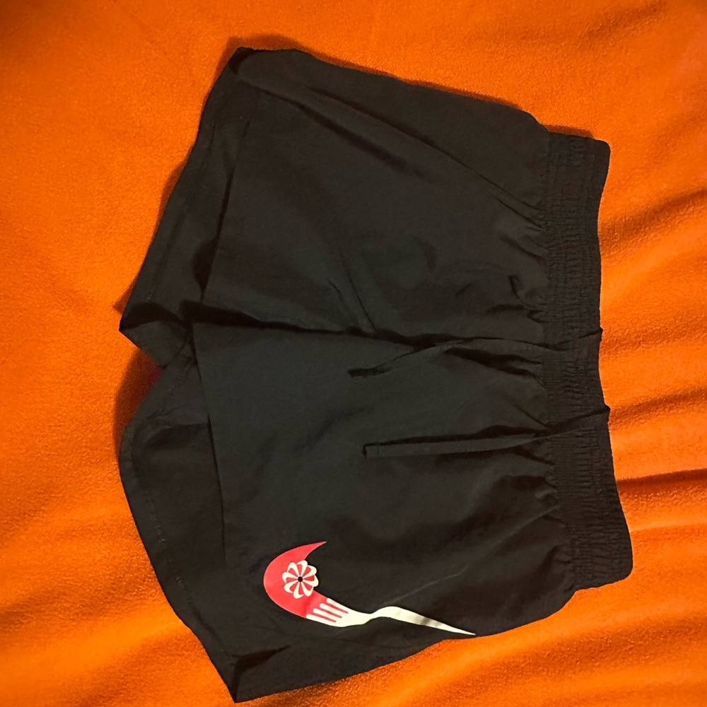 Nike Black Athletic Shorts with Pink and White Design